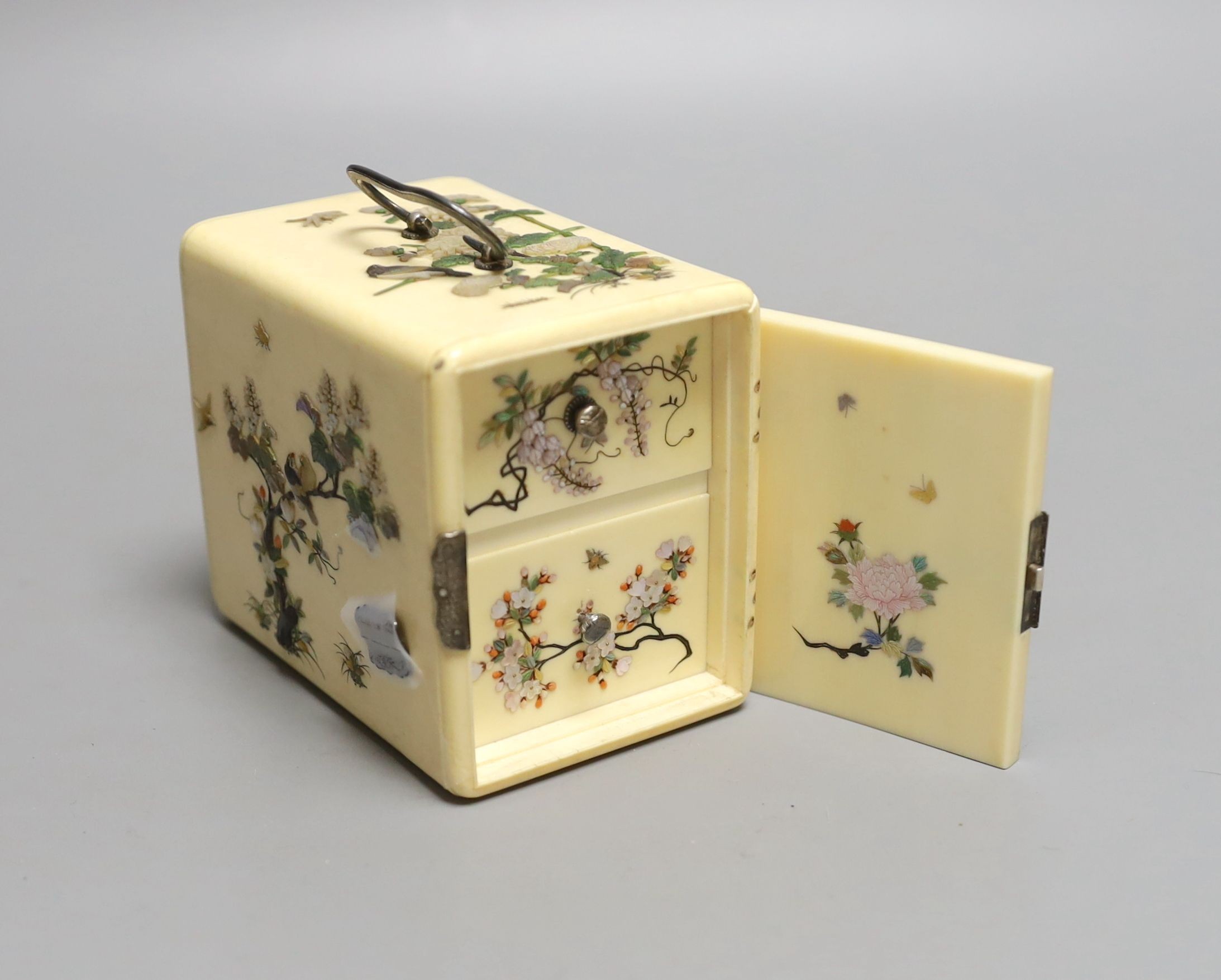 A Japanese Shibayama style ivory kodansu (table cabinet), Meiji period, with white metal lock, hinges and handles, 7cms high x 10 cms deep.